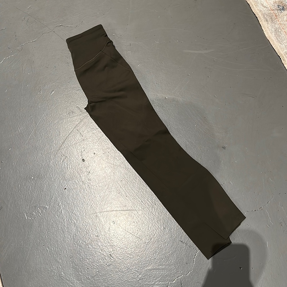 Dark green lululemon base pace pants, 25inch, size 4,